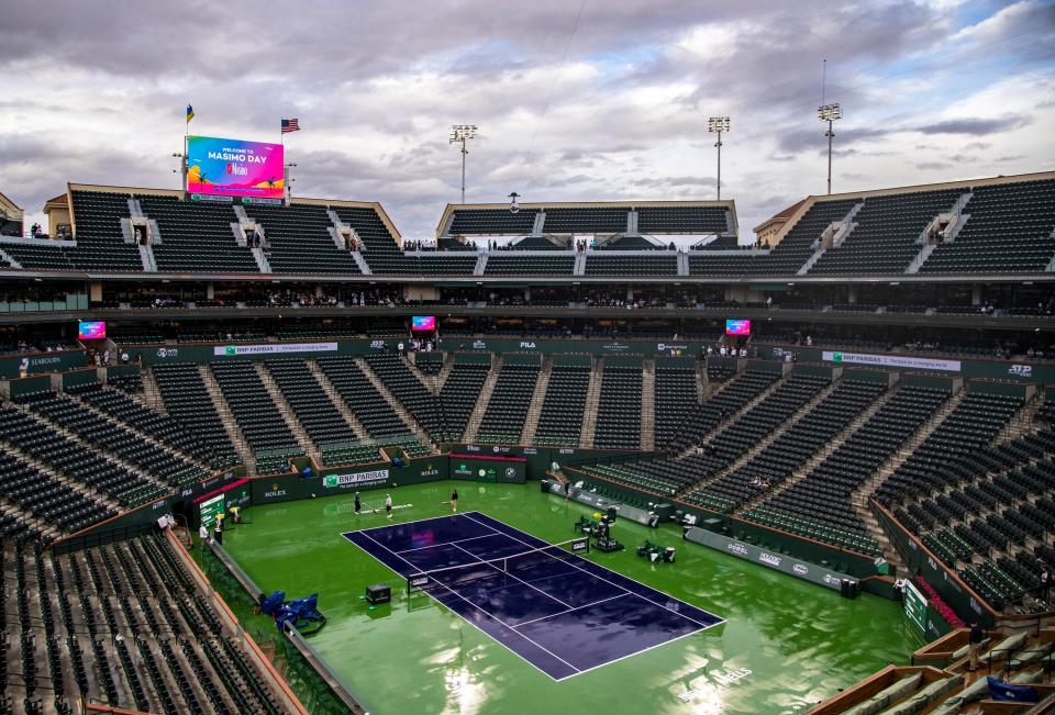 Stadium one is seen mostly empty during a rain delay interrupting the second-round match between Maria Sakkari and Shelby Rogers during the BNP Paribas Open at the Indian Wells Tennis Garden in Indian Wells, Calif., Friday, March 10, 2023. 