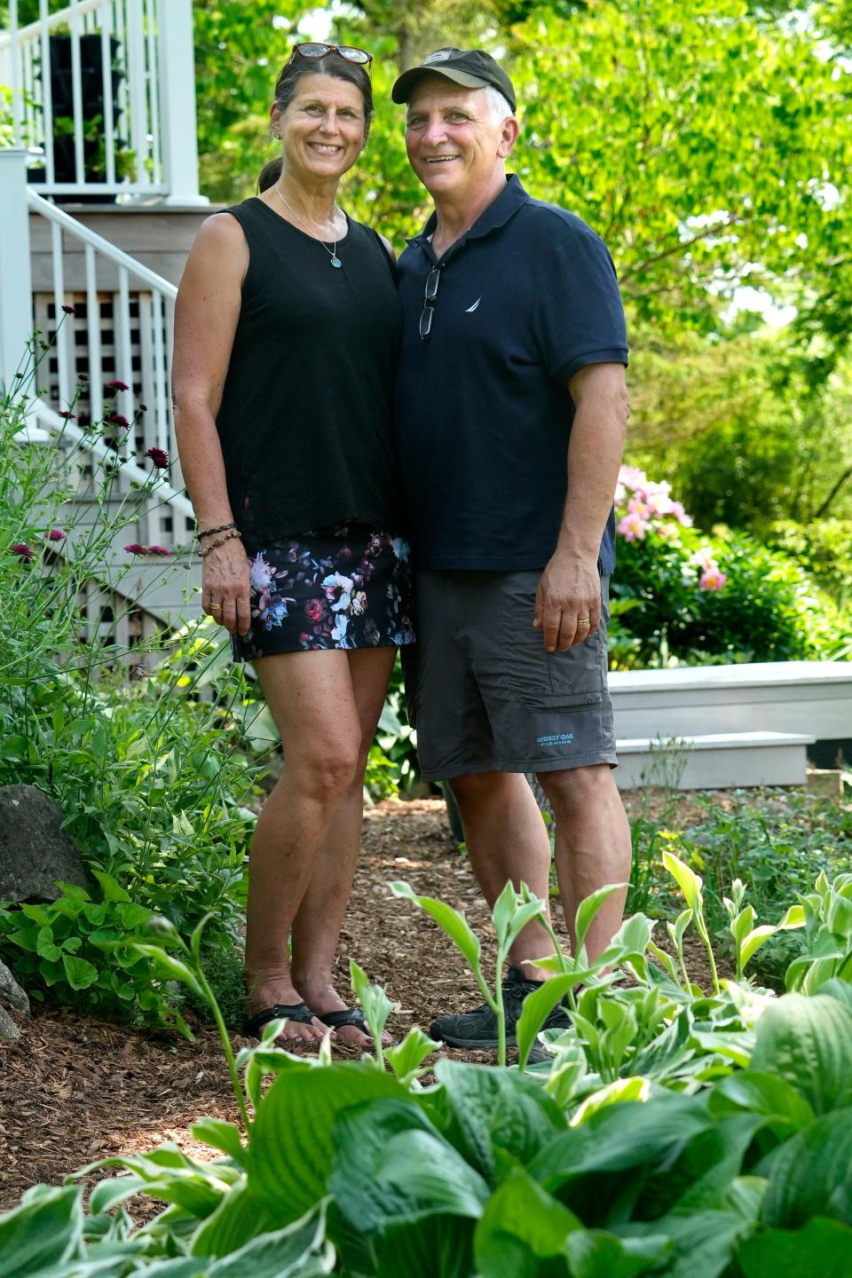 Susan and Tom Felmer in their garden on June 22, 2023 at their home in Cedarburg.