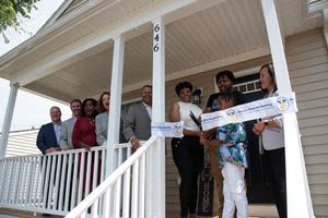 Elected officials and community leaders joined representatives from Newport News Shipbuilding and Habitat for Humanity Peninsula and Greater Williamsburg Thursday to welcome the Hunter family to their new home. The house is the 19th that shipyard volunteers have constructed in partnership with Habitat for Humanity.