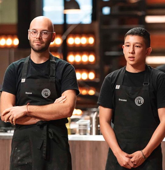 MasterChef's Brendan and Reece in black aprons