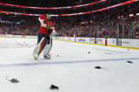 Florida Panthers goaltender Sergei Bobrovsky skates to join teammates for a group photo after the Panthers beat the Carolina Hurricanes in Game 4 of the NHL hockey Stanley Cup Eastern Conference finals, Wednesday, May 24, 2023, in Sunrise, Fla. (AP Photo/Wilfredo Lee)
