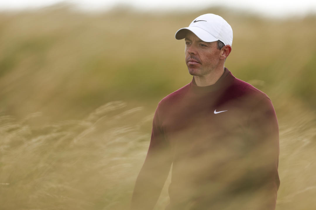 Rory McIlroy of Northern Ireland walks to his bar on the fourth hole during his second round of the British Open Golf Championships at Royal Troon golf club in Troon, Scotland, Friday, July 19, 2024. (AP Photo/Peter Morrison)