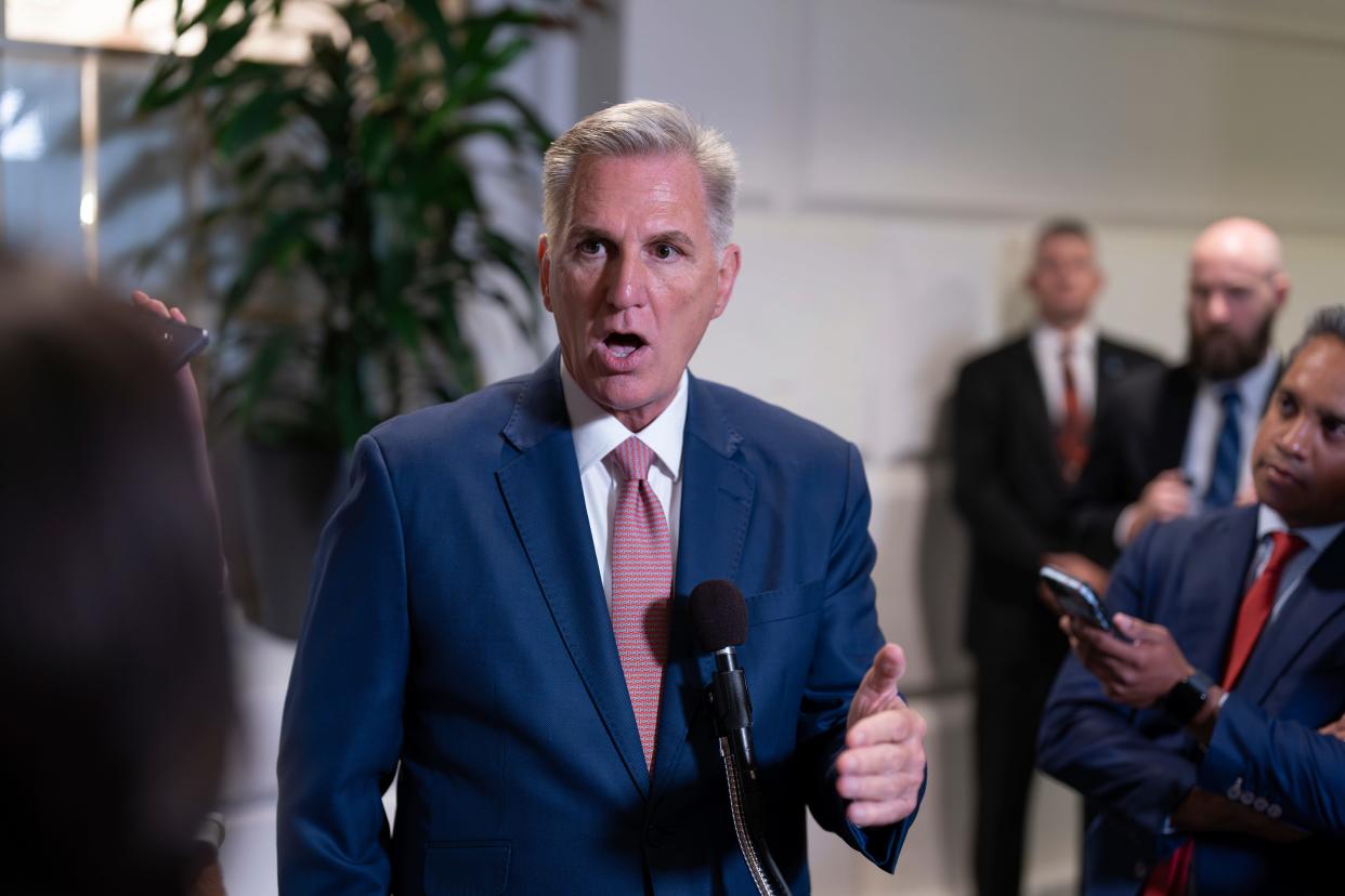 Speaker of the House Kevin McCarthy, R-Calif., talks to reporters about avoiding a government shutdown and launching an impeachment inquiry into President Joe Biden, following a closed-door meeting with fellow Republicans at the Capitol in Washington, Thursday, Sept. 14, 2023.