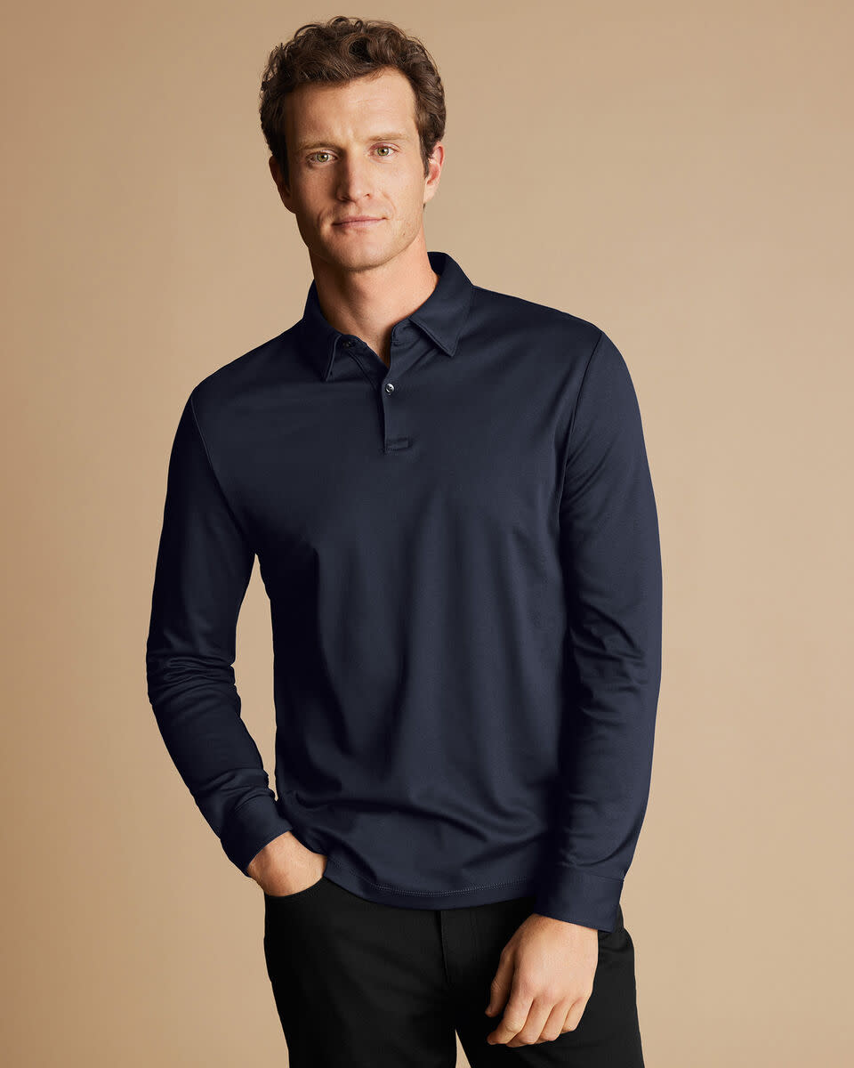 <p><a href="https://go.redirectingat.com?id=74968X1596630&url=https%3A%2F%2Fwww.charlestyrwhitt.com%2Fus%2Fsmart-long-sleeve-jersey-polo---navy%2FJEP0326NAV.html%3Fgad_source%3D1%26gclid%3DCjwKCAjwoa2xBhACEiwA1sb1BMLon9HZvRCHkNYGJJv34p8QvVan3gWF1sY4VttfAyhRzd3GbxKEThoC52MQAvD_BwE%26marketing%3Dtrue%26marketingCode%3Dus39t3&sref=https%3A%2F%2Fwww.esquire.com%2Fstyle%2Fmens-fashion%2Fg42661607%2Fgolf-shirts-for-men%2F" rel="nofollow noopener" target="_blank" data-ylk="slk:Shop Now;elm:context_link;itc:0;sec:content-canvas" class="link ">Shop Now</a></p><p>Smart Polo</p><p>charlestyrwhitt.com</p><p>$109.00</p>