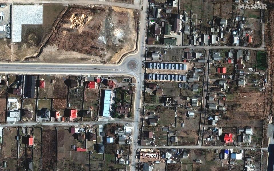 A satellite image shows an overview of Yablonska Street, in Bucha - REUTERS