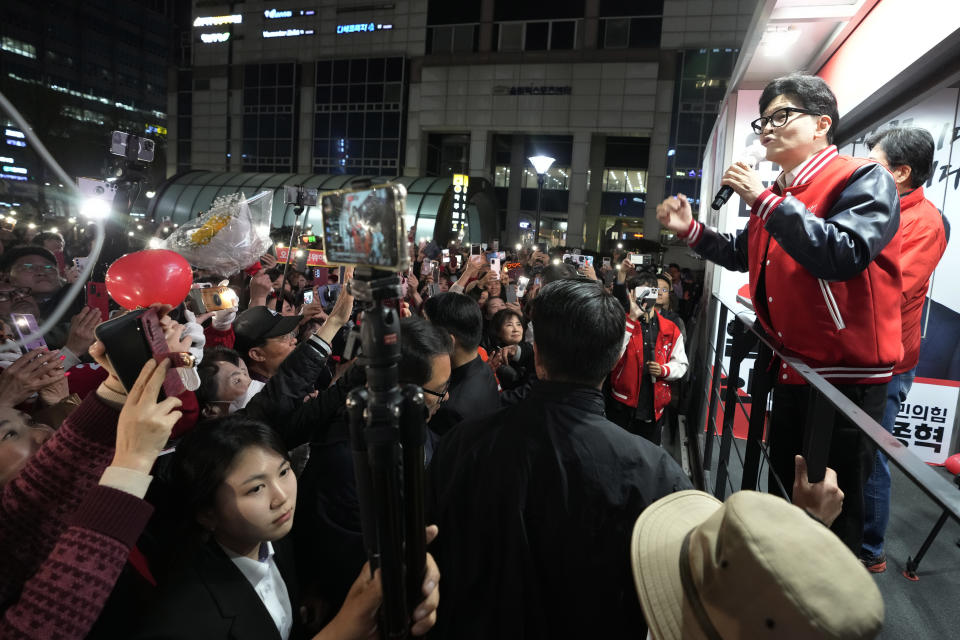 The ruling People Power Party's leader Han Dong-hoon, right, speaks during a campaign rally for the upcoming parliamentary election in Goyang, South Korea, Monday, April 8, 2024. As South Koreans head to the polls to elect a new 300-member parliament on this week, many are choosing their livelihoods and other domestic concerns as the most important election issues. It's in a stark contrast from past elections that were overshadowed by security and foreign policy issues like North Korean nuclear threats and U.S. security commitment for South Korea. (AP Photo/Ahn Young-joon)