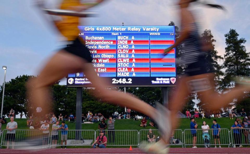 Runners are a blur in the girls 3200 relay at the CIF Central Section Masters track and field meet, held at Veterans Memorial Stadium on Saturday, May 20, 2023 in Clovis.