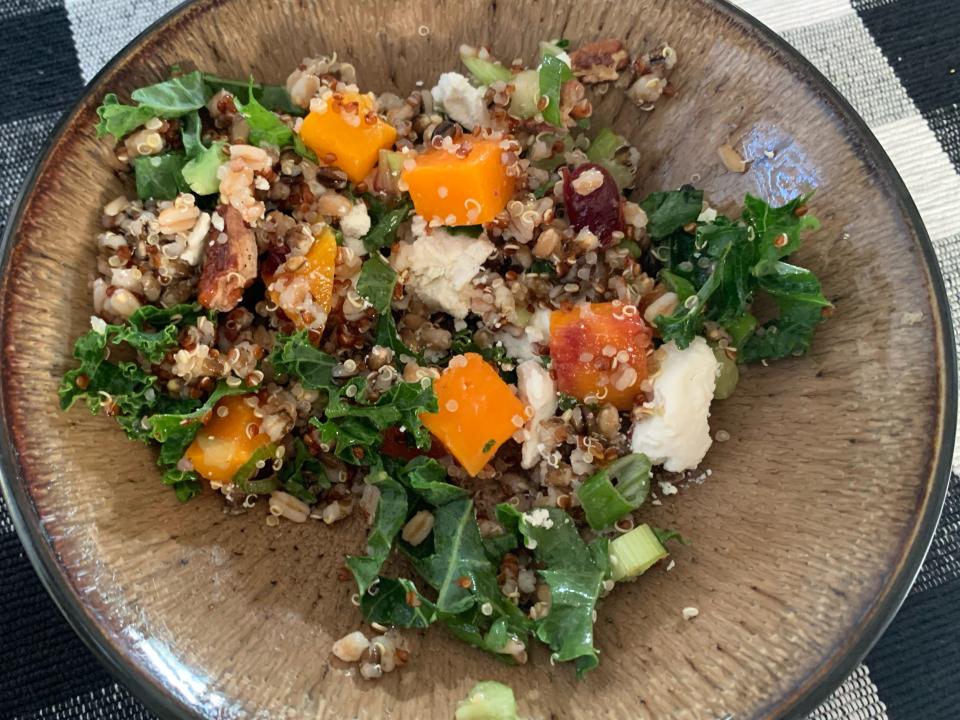 trader joes harvest salad poured into brown bowl