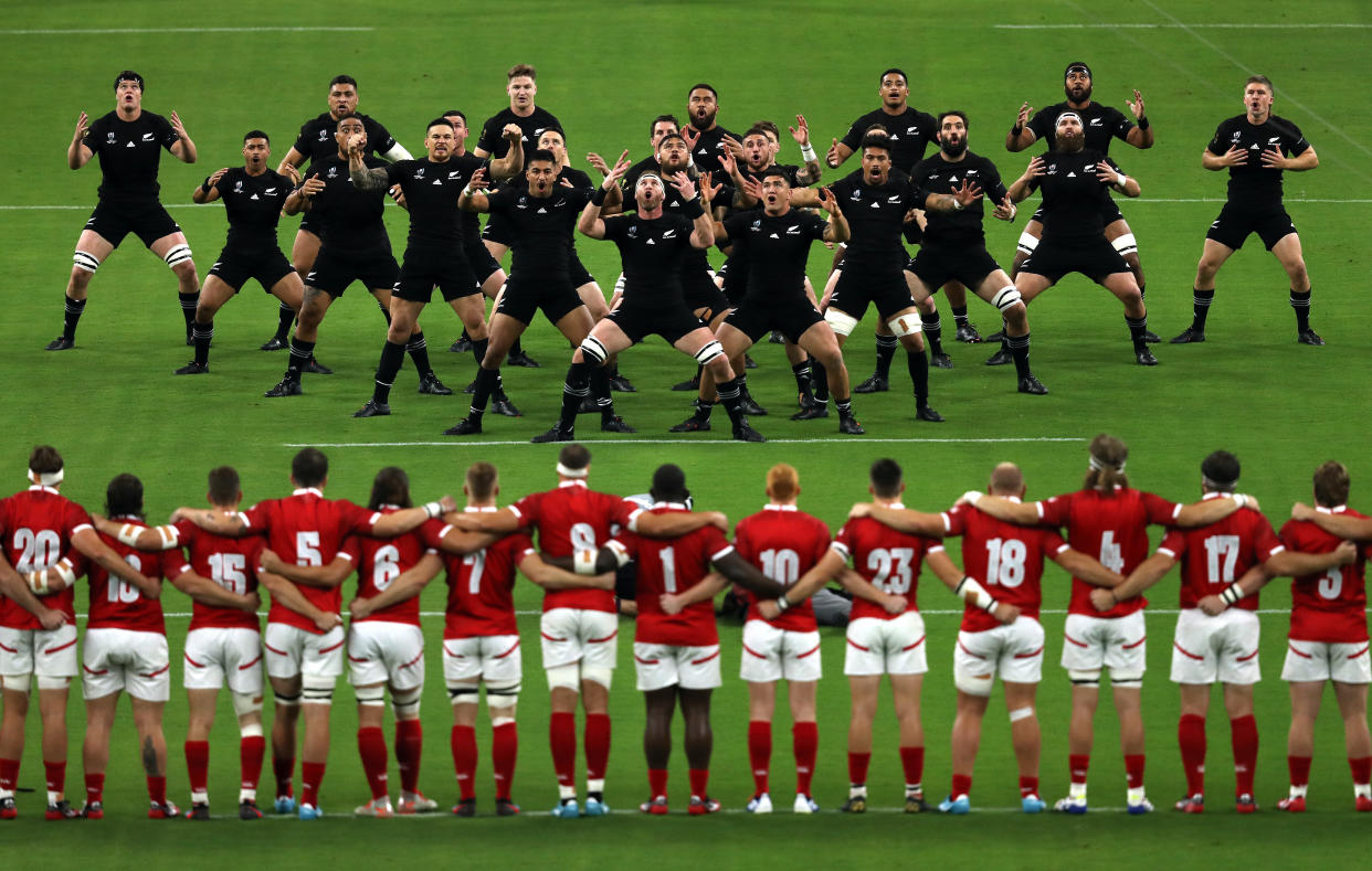 OITA, JAPAN - OCTOBER 02:  New Zealand players perform the Haka prior to the Rugby World Cup 2019 Group B game between New Zealand and Canada at Oita Stadium on October 02, 2019 in Oita, Japan. (Photo by Shaun Botterill/Getty Images)