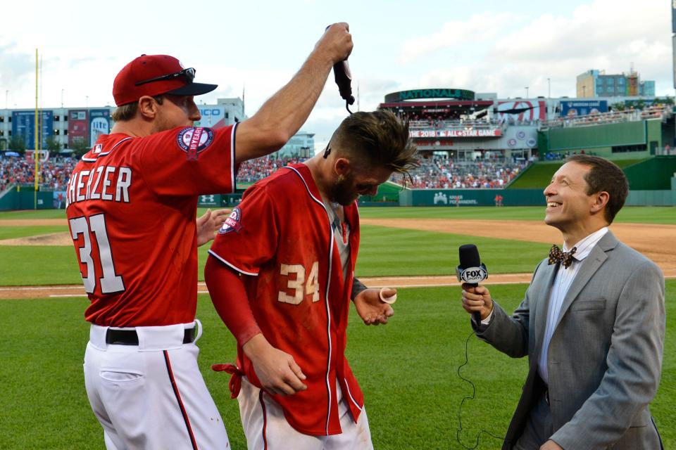 Ken Rosenthal interviews Bryce Harper as pitcher Max Scherzer pour chocolate syrup on the right fielder after a game against the Atlanta Braves at Nationals Park on May 9, 2015.