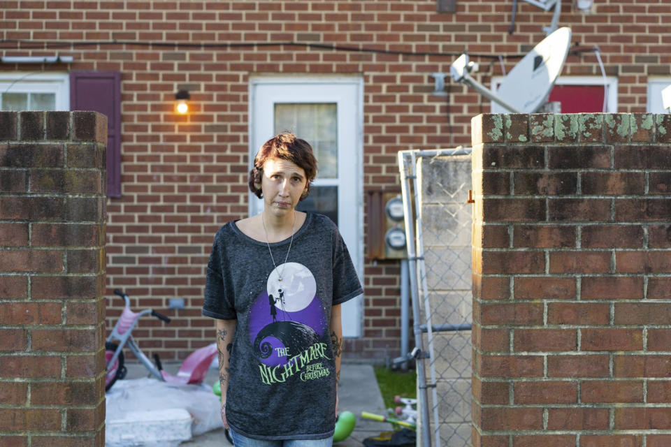 Kandise Norris, 30, lives in a home owned by the Housing Authority of Crisfield in Somerset County, Maryland. She said she has been rebuilding her life since getting treatment for drug addiction in April 2019. The housing authority has filed three cases to evict her and her children since September. (Nick McMillan/Howard Center for Investigative Journalism via AP)