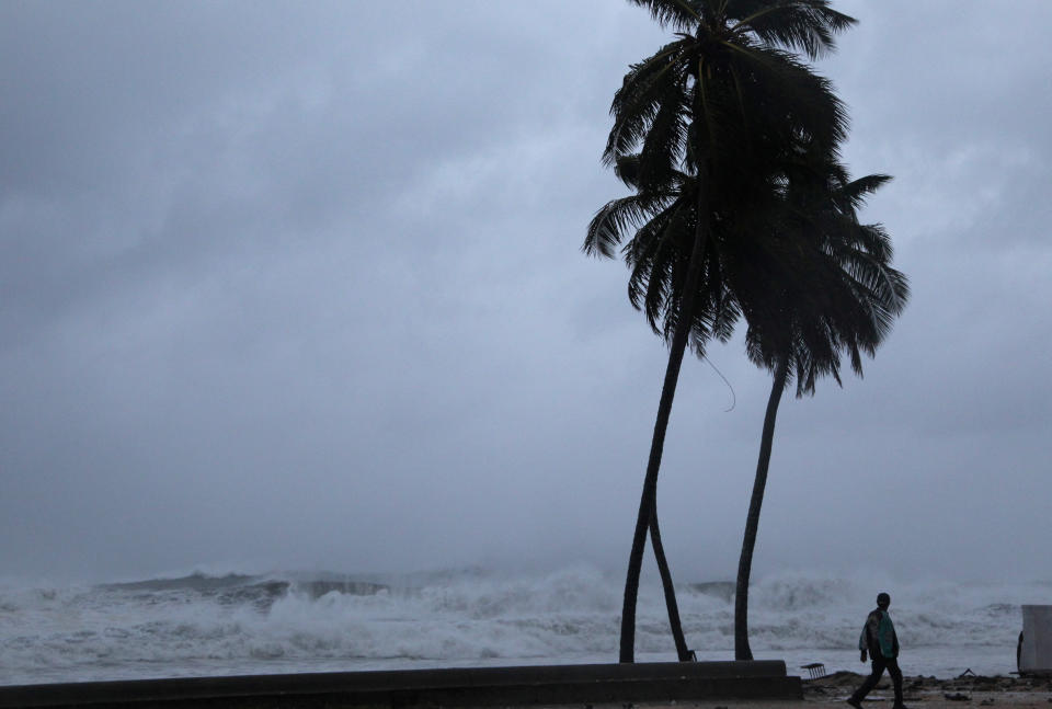 <p>A man walks on the shore as Hurricane Irma moves off from the northern coast of the Dominican Republic, in Nagua, Dominican Republic, Sept. 7, 2017. (Photo: Ricardo Rojas/Reuters) </p>