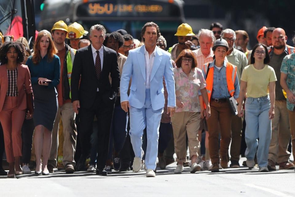 Los Angeles, CA - *EXCLUSIVE* - Actor Matthew McConaughey is back in front of the camera filming an untitled project.  Matthew, dressed in a baby blue suit, leads a mob of people through the streets of Downtown Los Angeles as the cameras roll.  Pictured: Matthew McConaughey BACKGRID USA SEPTEMBER 24, 2022 USA: +1 310 798 9111 / usasales@backgrid.com UK: +44 208 344 2007 / uksales@backgrid.com *UK Clients - Pictures Containing Children Please Pixelate Face Prior To Publication*