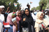 Sudanese protesters take part in a rally demanding the dissolution of the transitional government, outside the presidential palace in Khartoum, Sudan, Saturday, Oct. 16, 2021. (AP Photo/Marwan Ali)