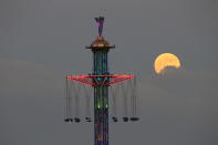 <p>A blood moon rises over Tel Aviv, Israel, Friday, July 27, 2018. (Photo: Ariel Schalit/AP) </p>