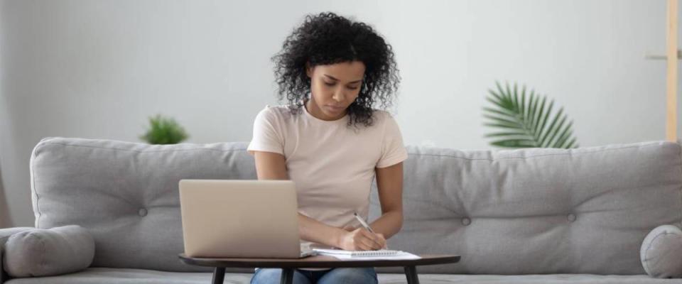 Woman writing.