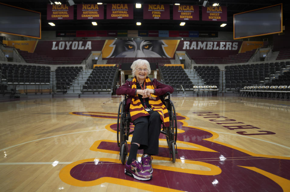 Sister Jean Dolores Schmidt, the Loyola University men's basketball chaplain and school celebrity, sits for a portrait in The Joseph J. Gentile Arena, on Monday, Jan. 23, 2023, in Chicago. The beloved Catholic nun captured the world's imagination and became something of a folk hero while supporting the Ramblers at the NCAA Final Four in 2018. (AP Photo/Jessie Wardarski)