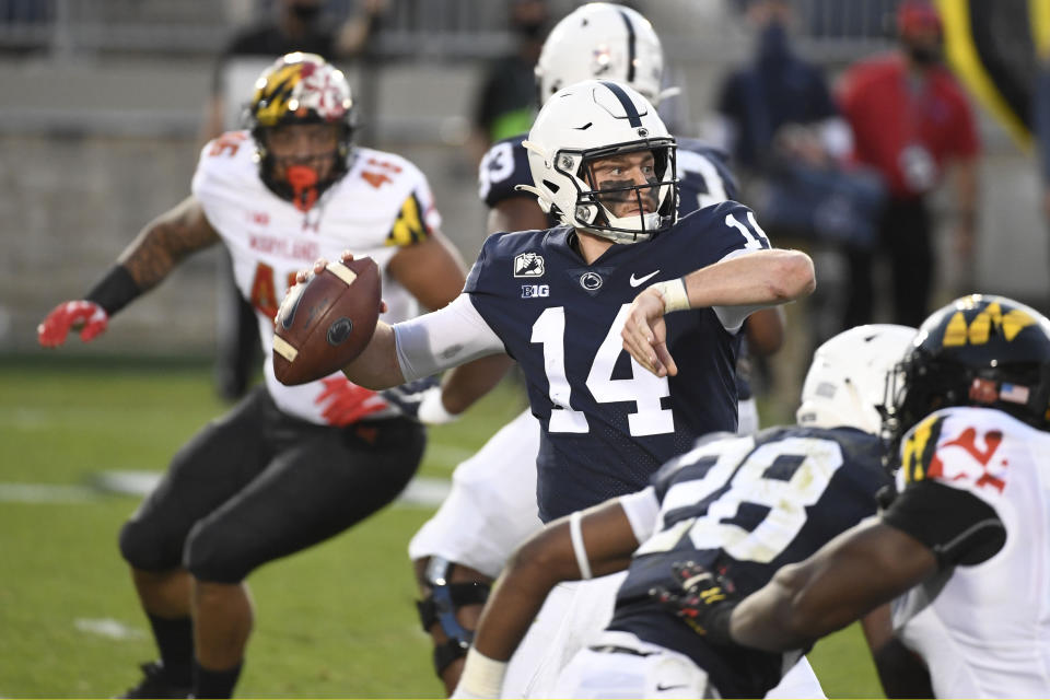 Penn State quarterback Sean Clifford (14) looks to throw a second-quarter pass against Maryland during an NCAA college football game in State College, Pa., Saturday, Nov. 7, 2020. (AP Photo/Barry Reeger)