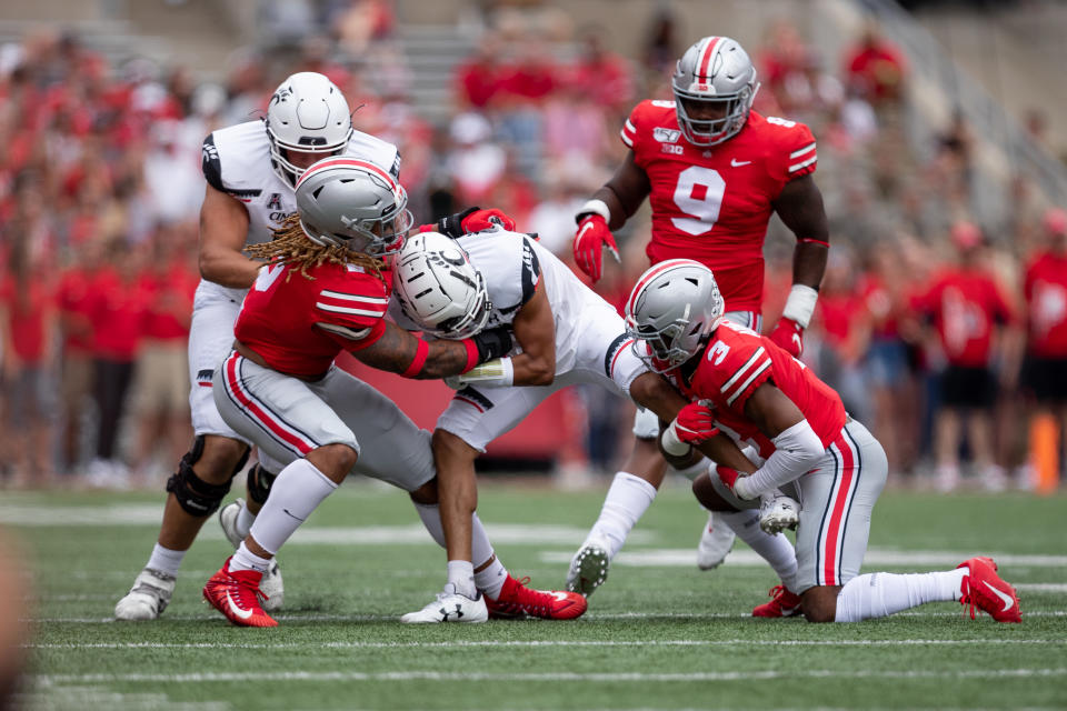 Ohio State DE Chase Young, left, has dominated through two games. (Getty Images)