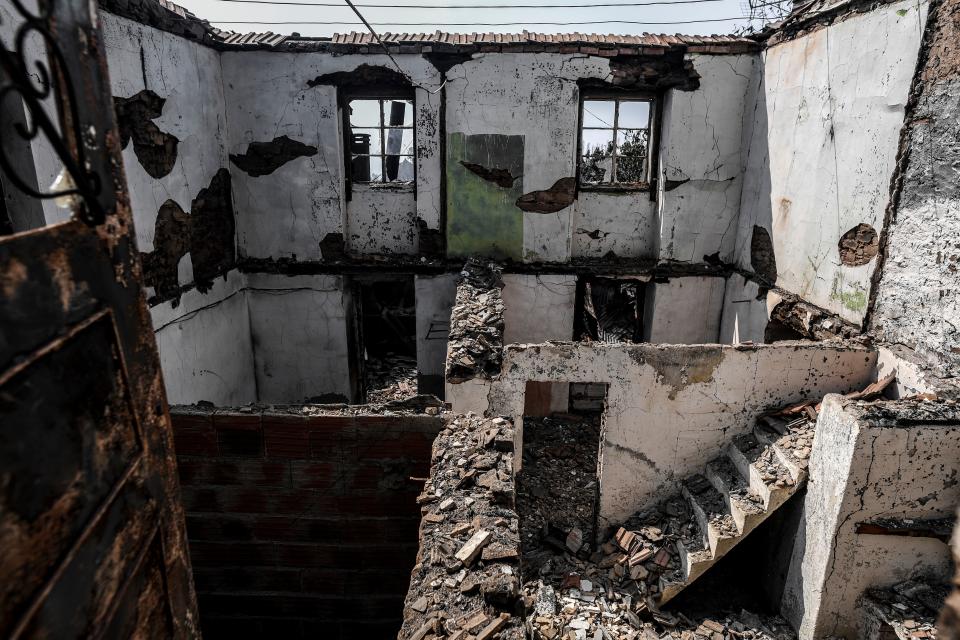 Picture shows ruins of a house after a wildfire in Roda village, Macao, in central Portugal on July 22, 2019. (Photo: Patricia De Melo Moreira/AFP/Getty Images)