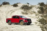 <p>The 2022 Honda Ridgeline is incredibly versatile, mixing some of the best attributes of both mid-size trucks and crossovers, which earns it a place on our <a href="https://www.caranddriver.com/features/a38873223/2022-editors-choice/" rel="nofollow noopener" target="_blank" data-ylk="slk:Editor's Choice list;elm:context_link;itc:0;sec:content-canvas" class="link ">Editor's Choice list</a>. The cargo box is obviously its defining feature, and it includes an underfloor trunk and a short-but-wide bed. Despite some truck-like styling cues, Honda's pickup can't hide its unibody construction, which limits its off-road capability and maximum tow rating but optimizes on-road comfort. Sure, the <a href="https://www.caranddriver.com/chevrolet/colorado" rel="nofollow noopener" target="_blank" data-ylk="slk:Chevy Colorado ZR2;elm:context_link;itc:0;sec:content-canvas" class="link ">Chevy Colorado ZR2</a> and <a href="https://www.caranddriver.com/jeep/gladiator" rel="nofollow noopener" target="_blank" data-ylk="slk:Jeep Gladiator;elm:context_link;itc:0;sec:content-canvas" class="link ">Jeep Gladiator</a> can go almost anywhere, but—like most other mid-sizers—their back-seat space and ride quality can't match the <a href="https://www.caranddriver.com/honda" rel="nofollow noopener" target="_blank" data-ylk="slk:Honda;elm:context_link;itc:0;sec:content-canvas" class="link ">Honda</a>. With a dutiful V-6 powertrain and standard all-wheel drive, it moves with purpose, and its independent rear suspension delivers poised handling. Consider the 2022 Ridgeline's many standard driver assists and comfy and quiet interior and you have a truck that's desirable and useful.<br></p><p><a class="link " href="https://www.caranddriver.com/honda/ridgeline" rel="nofollow noopener" target="_blank" data-ylk="slk:Review, Pricing, and Specs;elm:context_link;itc:0;sec:content-canvas">Review, Pricing, and Specs</a></p>