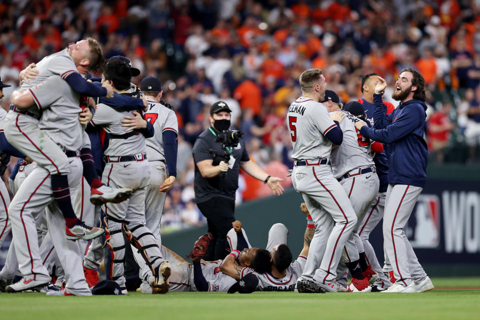 The Atlanta Braves celebrate their 7-0 victory in Game 6 against the Houston Astros to win the 2021 Major League Baseball World Series. (Photo by Elsa/Getty Images)