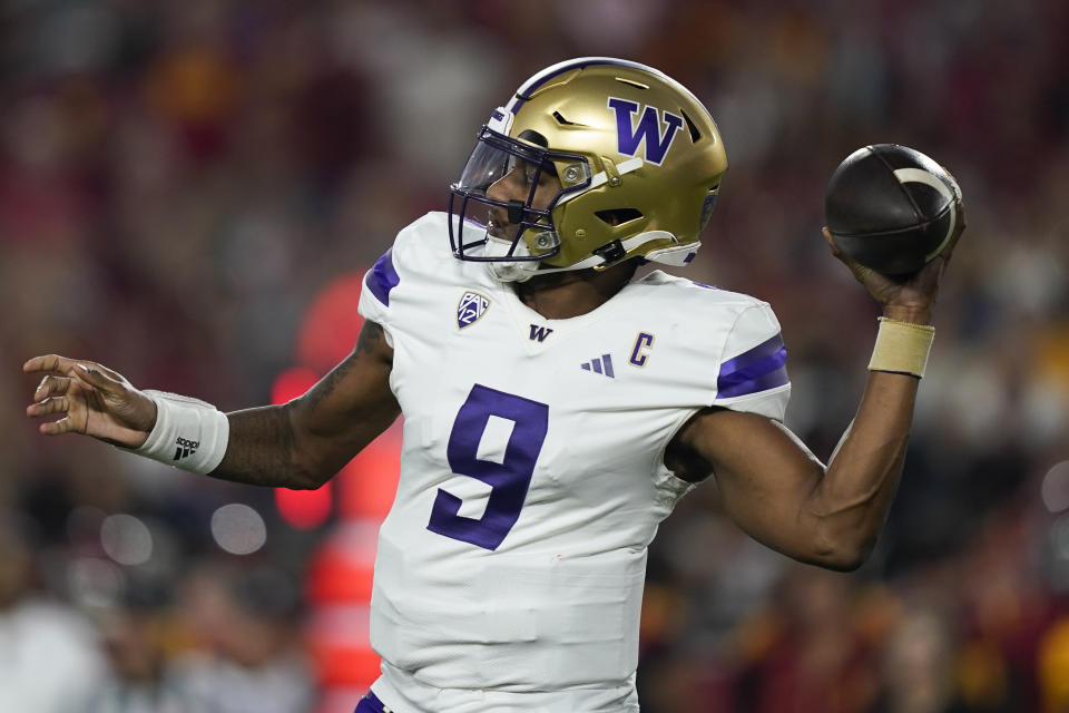 Washington quarterback Michael Penix Jr. throws a pass during the first half of the team's NCAA college football game against Southern California, Saturday, Nov. 4, 2023, in Los Angeles. (AP Photo/Ryan Sun)