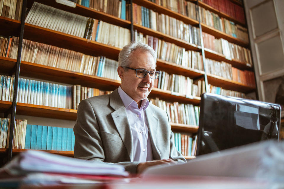 A man working in a library