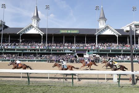 Nov 3, 2018; Louisville, KY, USA; Horses run down the front stretch during the Breeders Cup Dirt Mile in the 35th Breeders Cup world championships at Churchill Downs. Mandatory Credit: Brian Spurlock-USA TODAY Sports