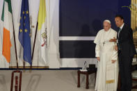 Pope Francis talks with Irish Prime Minister Leo Varadkar during their meeting, in Dublin, Ireland, Saturday, Aug. 25, 2018. Pope Francis is on a two-day visit to Ireland. (AP Photo/Gregorio Borgia)