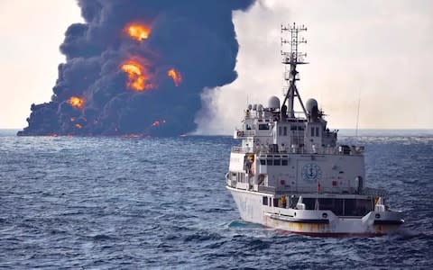 Transport Ministry of China released on January 14, 2018 shows smoke and flames coming from the burning oil tanker "Sanchi"