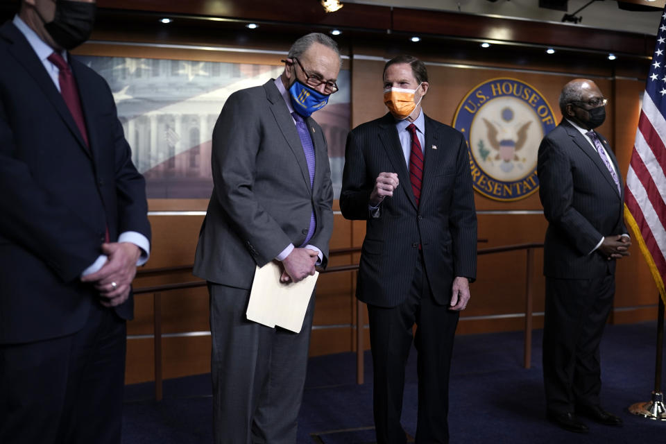 Senate Majority Leader Chuck Schumer, D-N.Y., left, and Sen. Richard Blumenthal, D-Conn., attend a news conference on passage of gun violence prevention legislation, at the Capitol in Washington, Thursday, March 11, 2021. (AP Photo/J. Scott Applewhite)