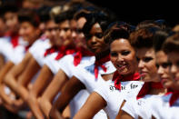 Grid girls line up at the entrance to the pitlane during qualifying for the Monaco Formula One Grand Prix at the Circuit de Monaco on May 26, 2012 in Monte Carlo, Monaco. (Paul Gilham/Getty Images)