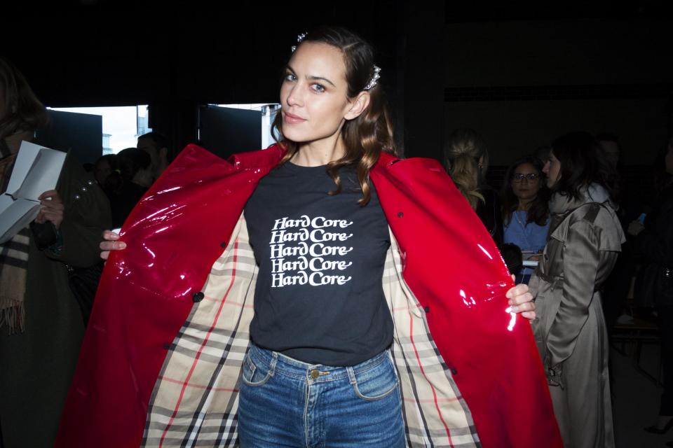 Alexa Chung in a laminated Burberry trench at London Fashion Week: Burberry