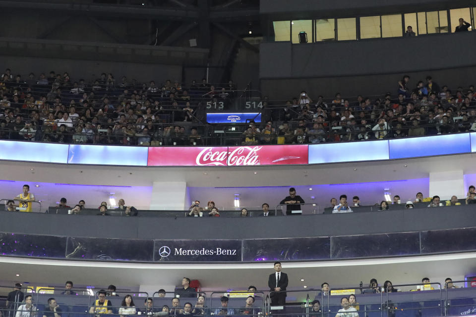 Most corporate sponsors advertisements were removed for a preseason NBA basketball game between Brooklyn Nets and Los Angeles Lakers at the Mercedes Benz Arena in Shanghai, China, Thursday, Oct. 10, 2019. In response to the NBA defending Daryl Morey's freedom of speech, Chinese officials took it away from the Los Angeles Lakers and Brooklyn Nets. All of the usual media sessions surrounding the Lakers-Nets preseason game in Shanghai on Thursday _ including a scheduled news conference from NBA Commissioner Adam Silver and postgame news conferences with the teams _ were canceled. (AP Photo)