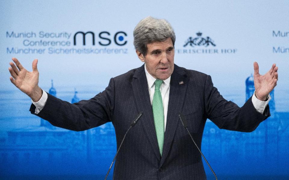 US Secretary of State John Kerry speaks during the Munich Security Conference at the Bayerischer Hof Hotel Saturday, Feb. 1, 2014 in Munich, southern Germany. The annual meeting was set to deal with thorny international issues, from the Syrian war and Ukraine's turmoil to Iran's nuclear program and US online surveillance. (AP Photo/Brendan Smialowski ,Pool)