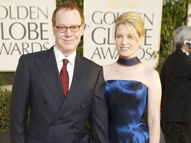 <p>Carlo Allegri/Getty</p> Danny Elfman and Bridget Fonda attend the 61st Annual Golden Globe Awards