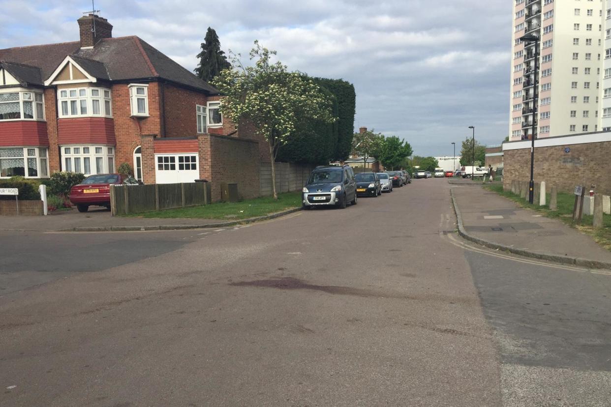A patch of blood at the scene in Enfield where the victim, a man in his 40s, was stabbed to death by a gang of masked youths