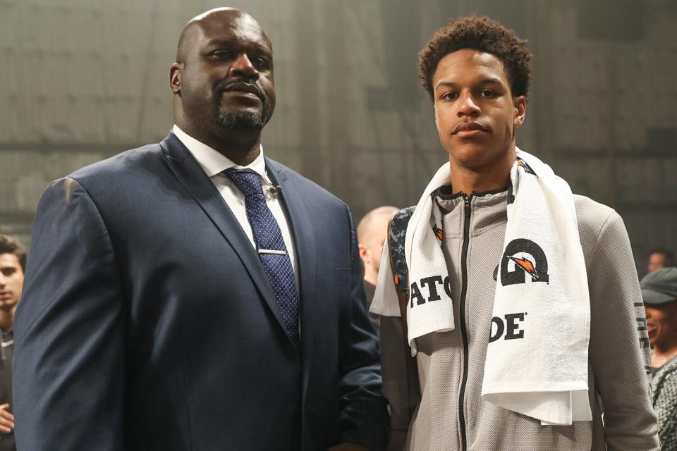 Shaquille O'Neal (L) poses with his son Shareef O'Neal (R) at the Jordan Brand Future of Flight Showcase on January 25, 2018 in Studio City, California.