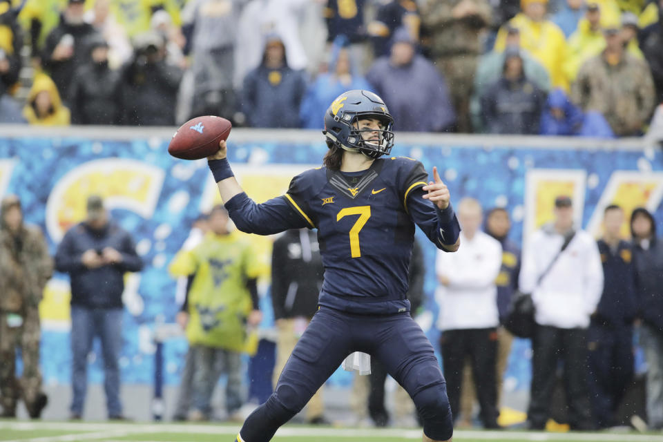 West Virginia quarterback Will Grier (7) during the first half/second half of an NCAA college football game, Saturday, Oct. 28, 2017, in Morgantown, W.Va. (AP Photo/Raymond Thompson)