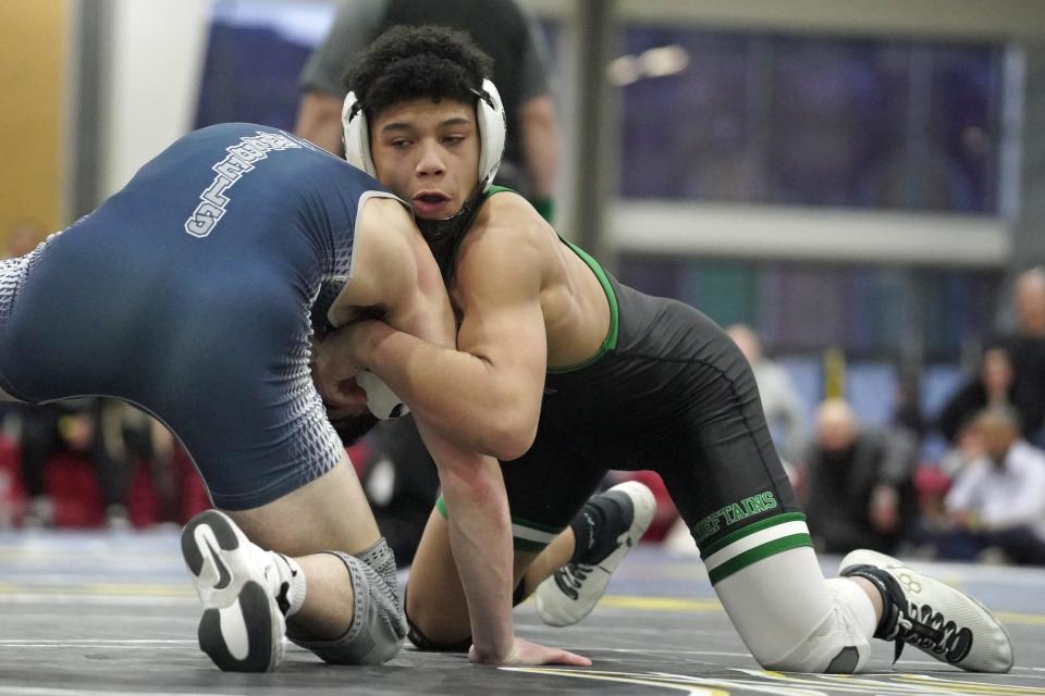 Ponaganset's David Perez, shown competing against South Kingstown's Benjamin White on Saturday, says: "We're definitely here to win every time."