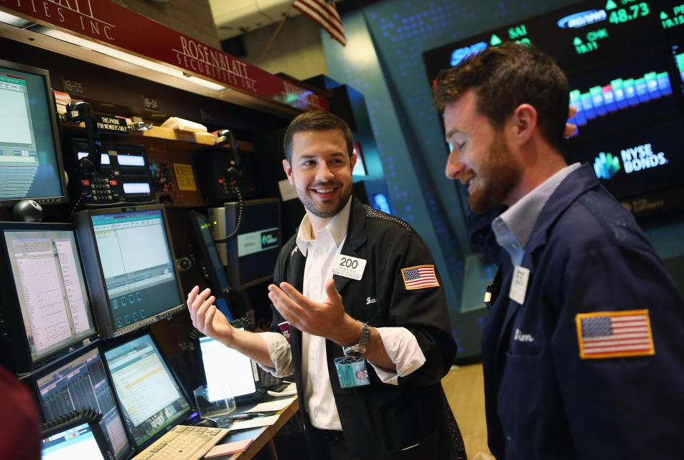 Investors on the floor of the New York Stock Exchange