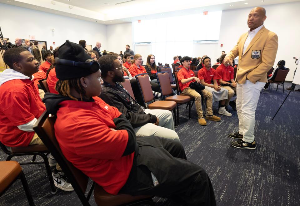 Pro Football Hall of Fame enshrinee Aeneas Williams talks with local students during a group discussion at the Hall in Canton. A renewed and enhanced partnership between Centene Corp. and the Pro Football Hall of Fame will continue to bring youth-focused programming to communities nationwide.