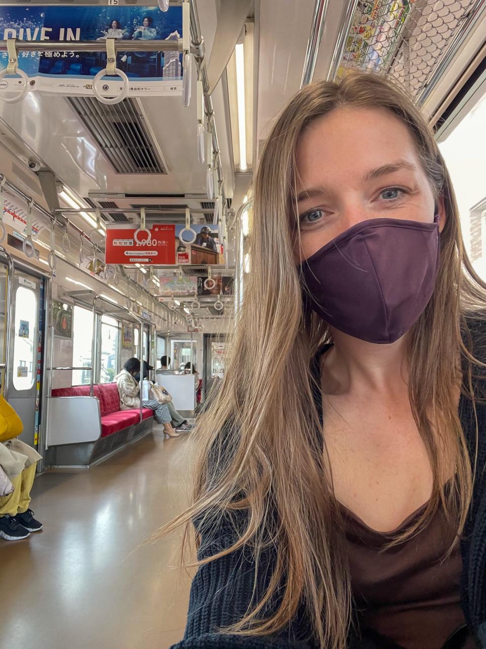 Insider's author on a subway car in Tokyo.