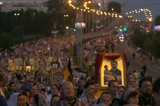 Many of the fervent believers came from across Russia and abroad to take part in the colourful ceremony during which many carried icons