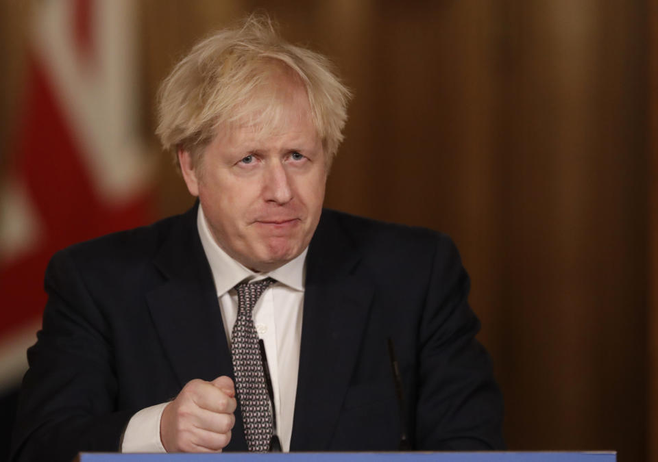 LONDON, ENGLAND - DECEMBER 16: United Kingdom Prime Minister Boris Johnson speaks during a news conference on the ongoing situation with the coronavirus pandemic, inside 10 Downing Street on December 16, 2020 in London, England. (Photo by Matt Dunham - WPA Pool/Getty Images)