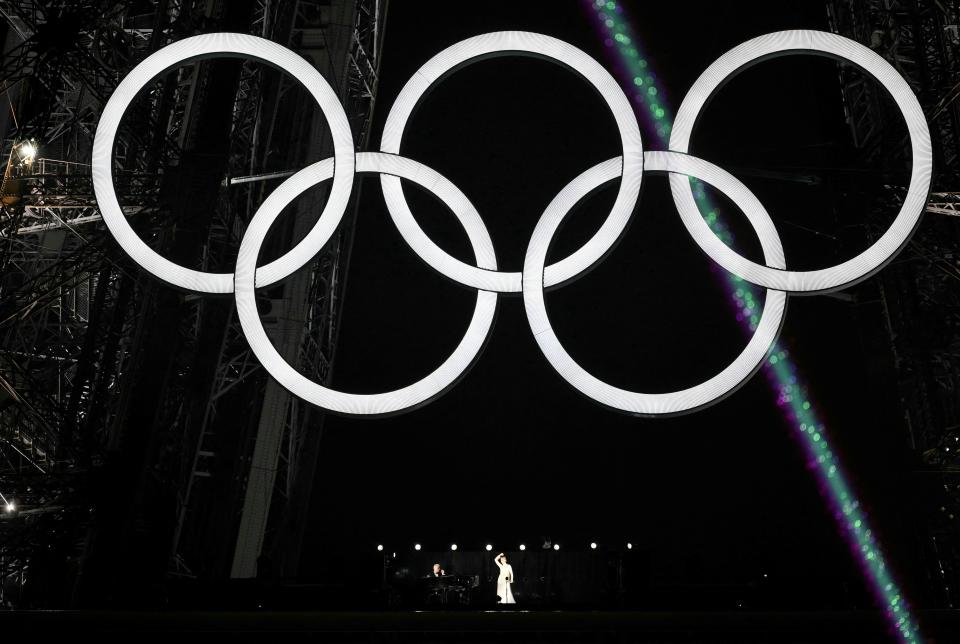 Canadian singer Celine Dion performs on the Eiffel Tower during the opening ceremony of the Paris 2024 Olympic Games in Paris on July 26, 2024. (Photo by Jonathan NACKSTRAND / AFP) (Photo by JONATHAN NACKSTRAND/AFP via Getty Images)