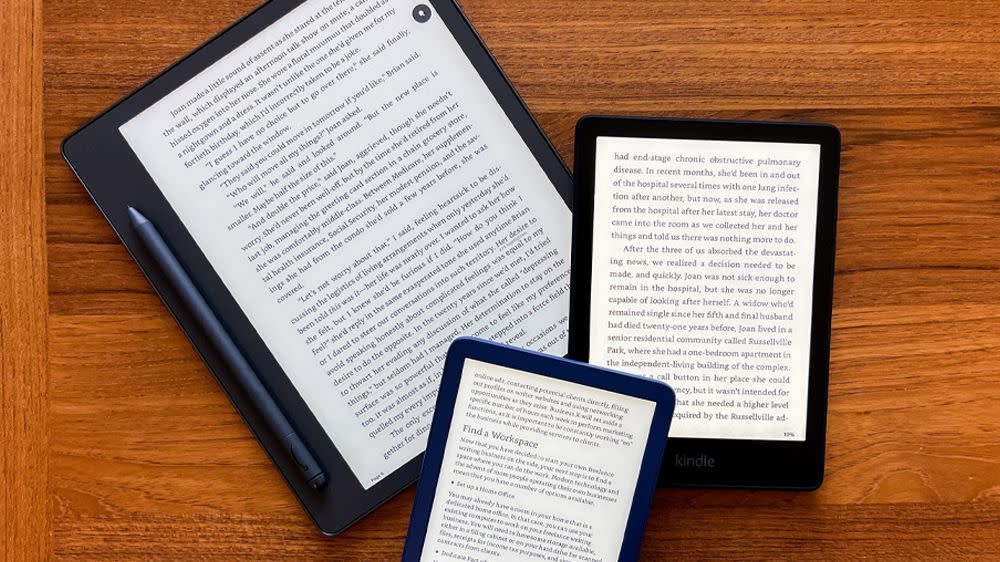 three different sized tablets on a table