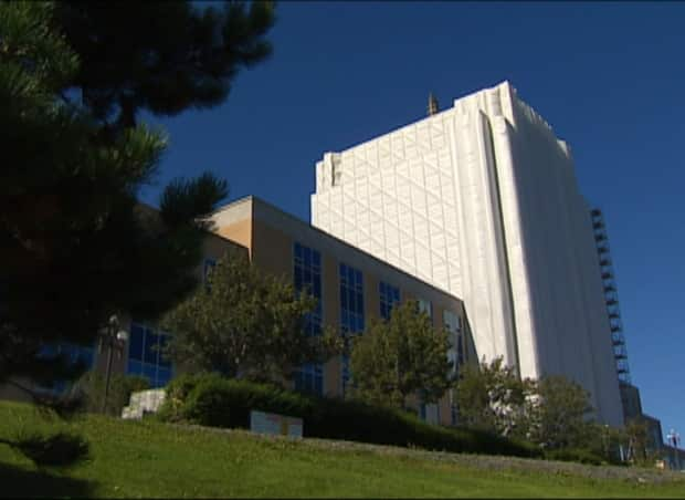 Tarps were used to cover parts of Confederation Building during repairs that stretched to six years, ending in 2015. 