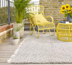<p> With stylish decking decorating ideas, your outdoor space can be just as pleasing to the eye and sense of touch as your interior scheme. </p> <p> Start by layering an outdoor rug on top of the deck. This one complements the wood beautifully with its silver colorway. Plus, it's easy to roll up and store away in winter, or use indoors for the duration. </p> <p> Choose garden furniture that would look as good indoors as out, too, and add comfort with cushions. Simple touches like a vase of flowers can also help turn your deck into a real outdoor living room. </p>